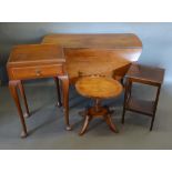 A George III Mahogany Oval Drop Flap Dining table with turned legs and pad feet, together with three