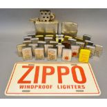 A Large Collection of Zippo Lighters, together with a collection of other similar lighters