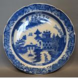 An Early Leeds Pottery Blue and White Large Charger decorated with the Willow pattern, 41cm diameter