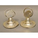 A Pair of Birmingham Silver Menu Holders in the form of artists palettes on shaped circular bases,