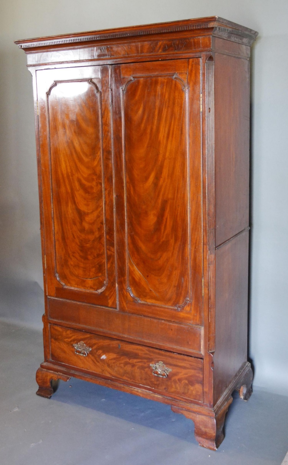 An Early 19th Century Mahogany Hall Cupboard, the moulded cornice above two doors enclosing a - Image 2 of 2