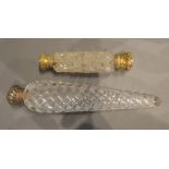 A Victorian Silver and Cut Glass Scent Bottle of spiral twist tapering form, 24cm long, together