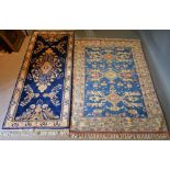 A North West Persian Style Woollen Rug, together with another similar rug