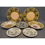 Two 18th Century Delft Deep Dishes, together with another similar pair of Delft plates and a pair of