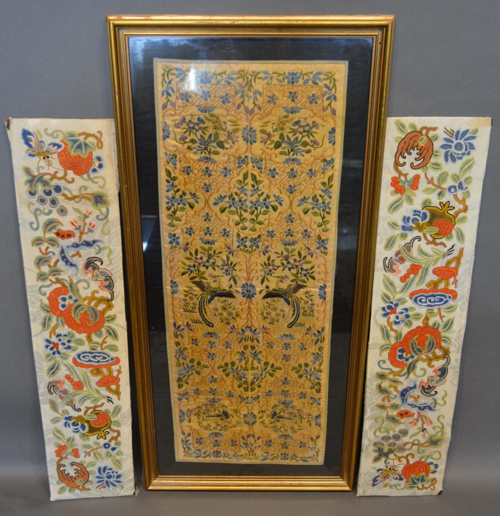 A Chinese Silkwork Panel depicting exotic birds amongst foliage, 51 x 19.5cm, together with a