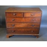 An 18th Century Oak Chest, the crossbanded top above two short and three long drawers with knob