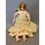 A 19th Century Wax Doll with lace clothing, 48cm long