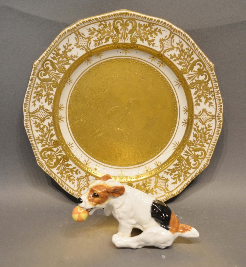 An Early 19th Century Porcelain Cabinet Plate, together with a Royal Doulton model of a dog