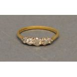 An 18 Carat Gold Five Stone Diamond Ring set with five graduated diamonds, claw set