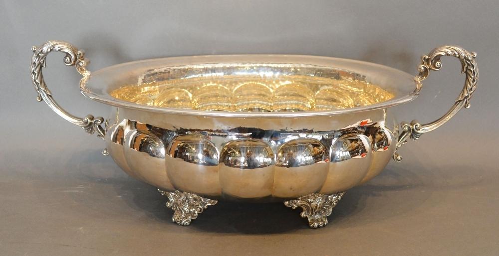 A 925 Silver Soup Tureen of lobed form with shaped feet and shaped handles, 63oz, 48cm long