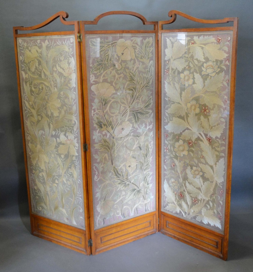 An Edwardian Three Fold Screen with three glazed silkwork panels, 176cm tall, 185cm wide