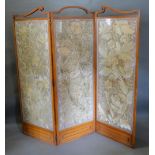 An Edwardian Three Fold Screen with three glazed silkwork panels, 176cm tall, 185cm wide
