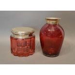 A London Silver and Cranberry Glass Jar of ribbed form, together with a Birmingham Silver Mounted