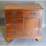 A 19th Century Mahogany Side Cabinet, the moulded top above an arrangement of five drawers and a