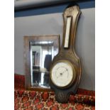 An Arts and Crafts Style Copper Rectangular Wall Mirror together with an oak barometer/thermometer