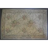 An Aubusson Style Woollen Rug with an allover foliate design upon a cream ground within borders, 180