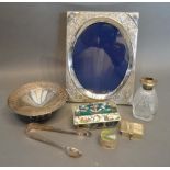 A White Metal Rectangular Photograph Frame, together with a silver and cut glass scent bottle and