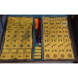A Mah Jong Set in fitted leather case