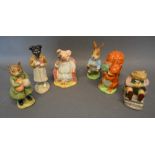 A Beswick Beatrix Potter Figure, Little Pig Robinson Spying, together with five other similar