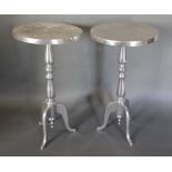 A Pair of Silvered Circular Occasional Tables with outswept legs, 40cm diameter