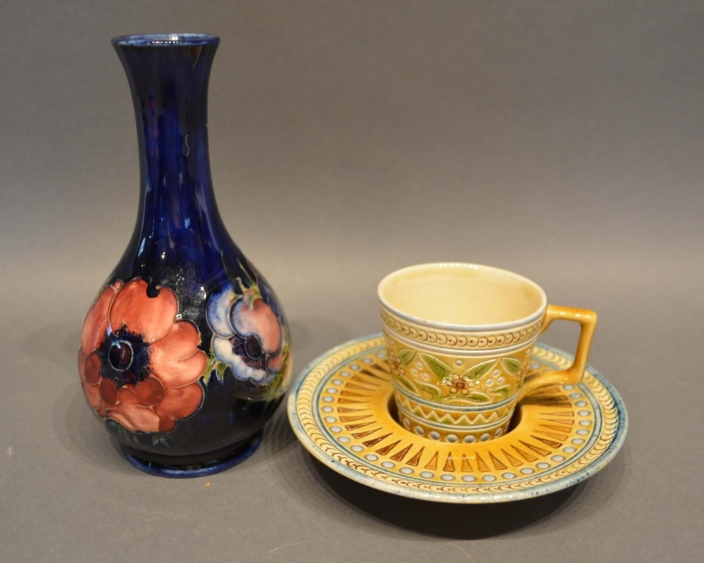 A Moorcroft Tube Lined Vase, 15.5cm tall, together with a Linthorpe cup and saucer