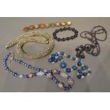 A Glass Bead Necklace, together with three other necklaces and two bracelets