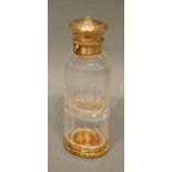 A Yellow Metal Mounted and Cut Glass Scent Bottle and Vinaigrette, 8cm long
