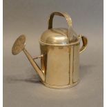 A Victorian London Silver Perfume Bottle in the form of a watering can, retailed by Andrew Barrett &