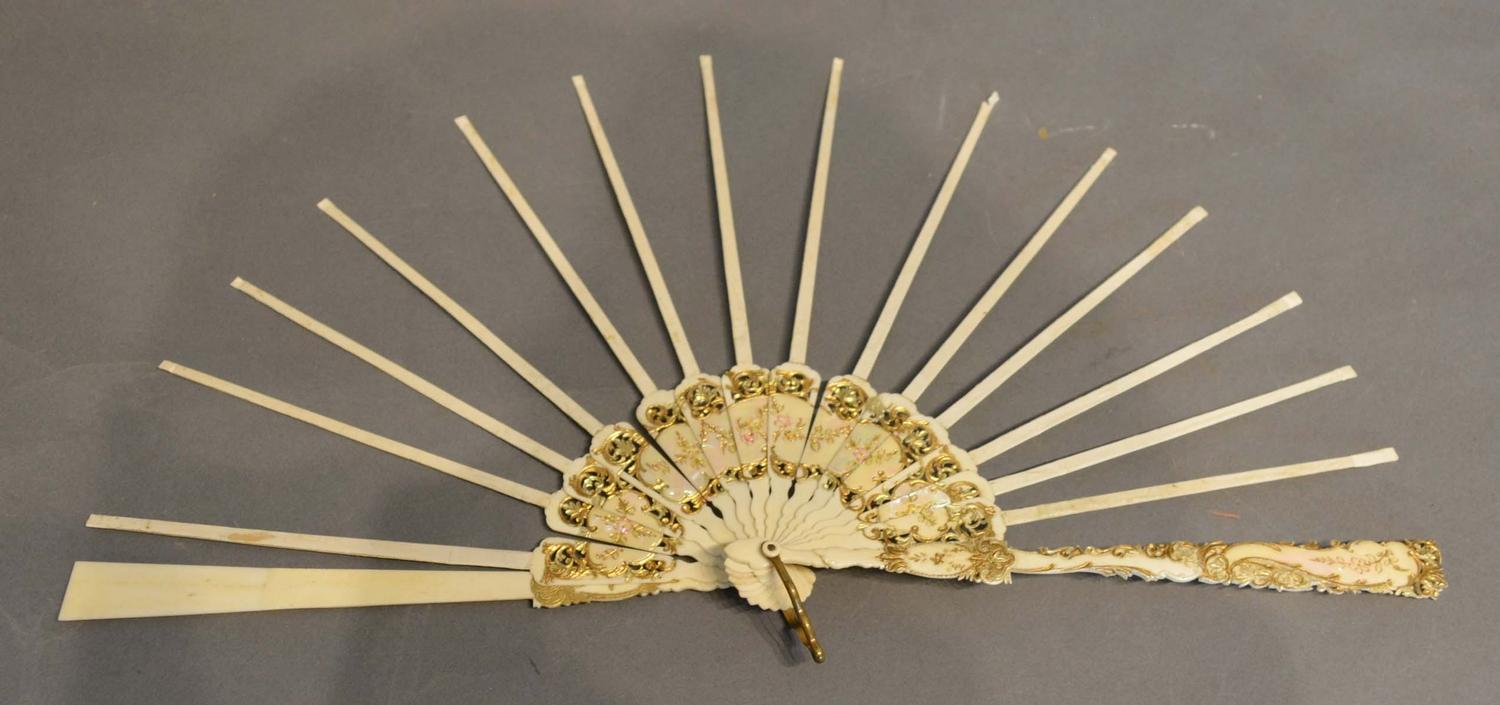 A Set of 19th Century Carved Sticks and Guards for a Fan, the sticks with pierced mother of pearl