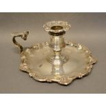 A Victorian Silver Chamber Candlestick of shaped outline, Sheffield 1850