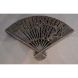 A Japanese Patinated Metal Box in the form of a fan, seal marked base, 16cm long