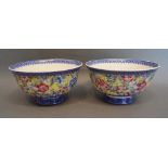 A Pair of Chinese Porcelain Pedestal Bowls, each decorated with polychrome enamels and with six