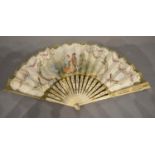 An 18th Century Carved Ivory Fan, the skin leaf depicting classical figures within a landscape