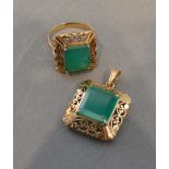 A Gold and Emerald Suite of Jewellery comprising a pendant with rectangular emerald within a pierced