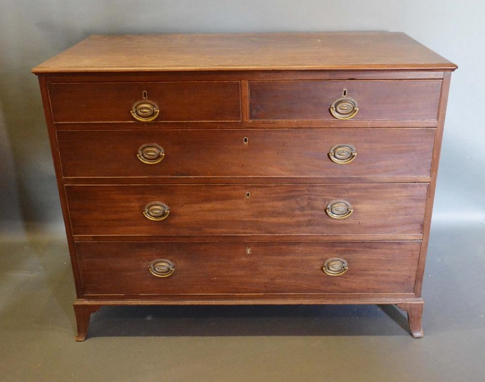 A 19th Century Mahogany Chest, the moulded top above two short and three long graduated drawers with