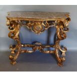 A French Gilded Console Table, the variegated serpentine marble top above a carved frieze raised