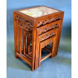 A Chinese Quartetto Nest of Hardwood Rectangular Tables, each with a variegated marble inset top