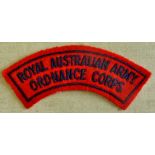 Australian Royal Army Ordnance Corps cloth shoulder title, blue on red