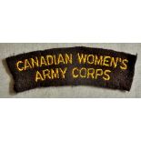 Canadian Women's Army Corps Cloth shoulder title, yellow on brown. A nice title