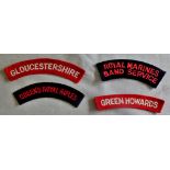 British Cloth Shoulder Titles (4) including: Royal Marines Band Service, Green Howards, Queen's