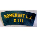 British XIII Somerset Light Infantry cloth shoulder title, yellow on green backing