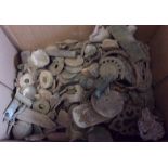 A large collection of metal detector finds including: many buttons, coins, artefacts, many mediev