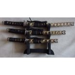 Miniature Samari Sword set (3), in snake scale style scabbards.