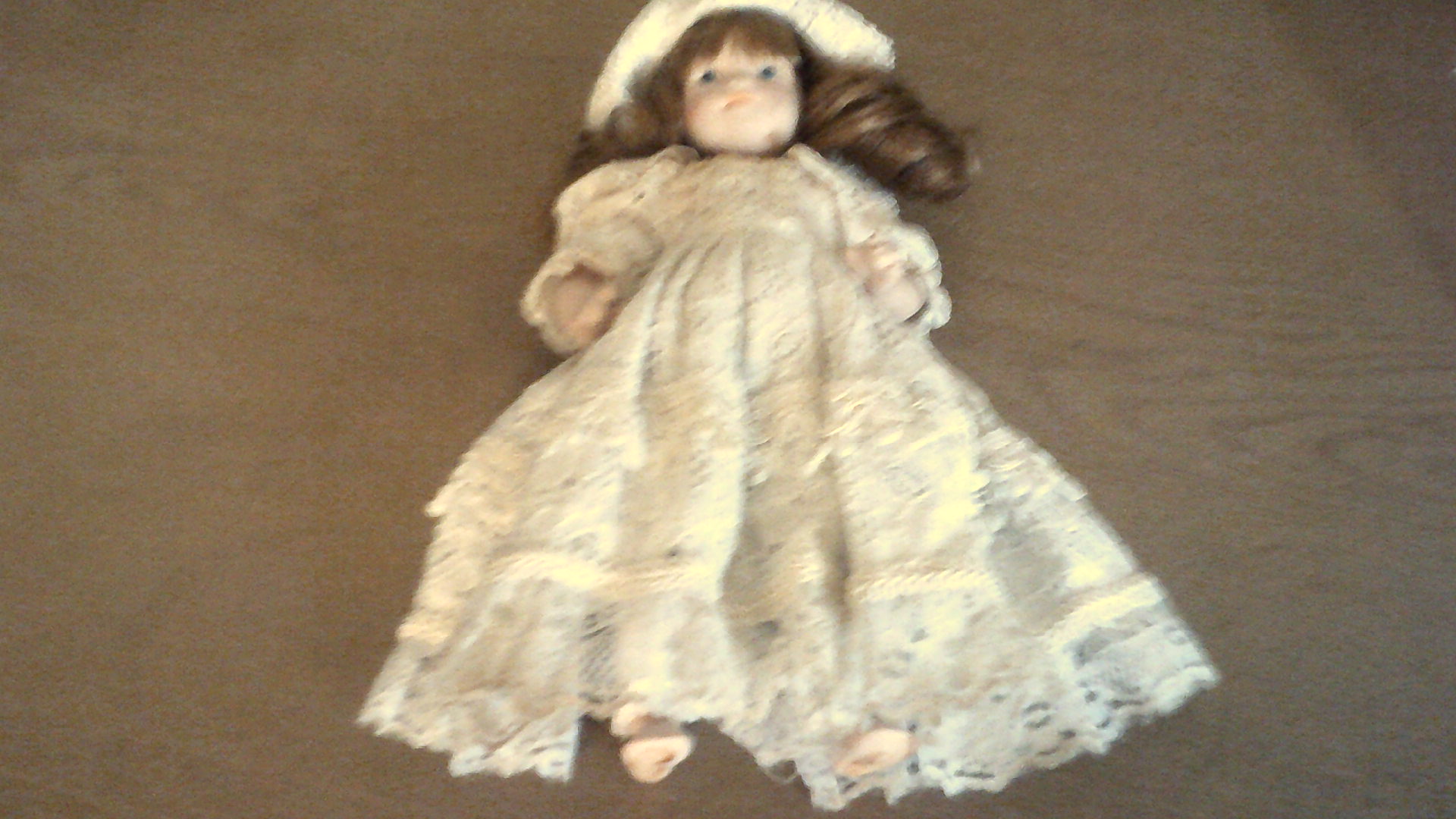 Vintage Porcelain Doll-No makers mark approx 9" (Porcelain body) good condition