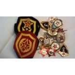 Soviet era military badges including: Officers cap badges and collar badges, Pilots proficiency