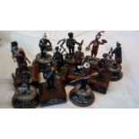 Soldiers (11) hand painted (Metal) on wooden stands in excellent condition