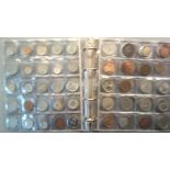 Small coin album with a range of mostly high grade modern, foreign coins, few older (150)