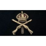 School of Musketry Forage Cap Badge (Gilding metal with red felt behind the crown) slider, as worn