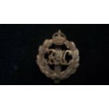 Royal Armoured Corps WWI Cap Badge (Brass), slider.