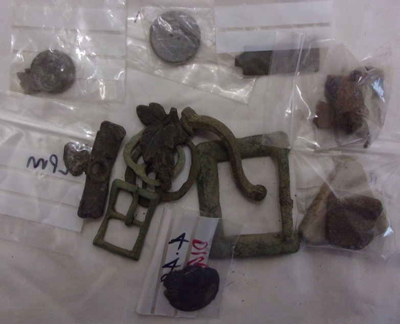 Metal Detector finds with various fragments including a fragment of a 17th century padlock and